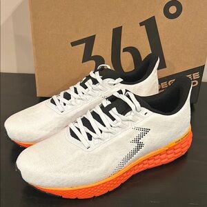 Dynamic White and Orange Athletic Shoes with Cushioned Sole